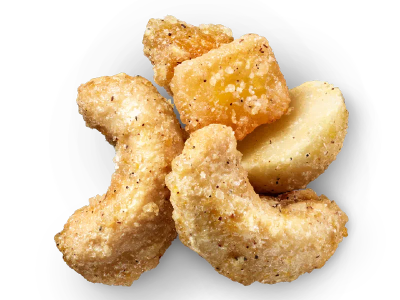 Glazed cashews, macadamias, and orange mango pieces with a tangerine vanilla coating.